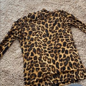 Sheer, tight cheetah print top